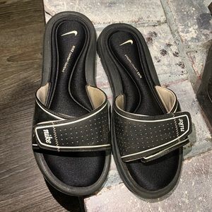 Black Nike slides